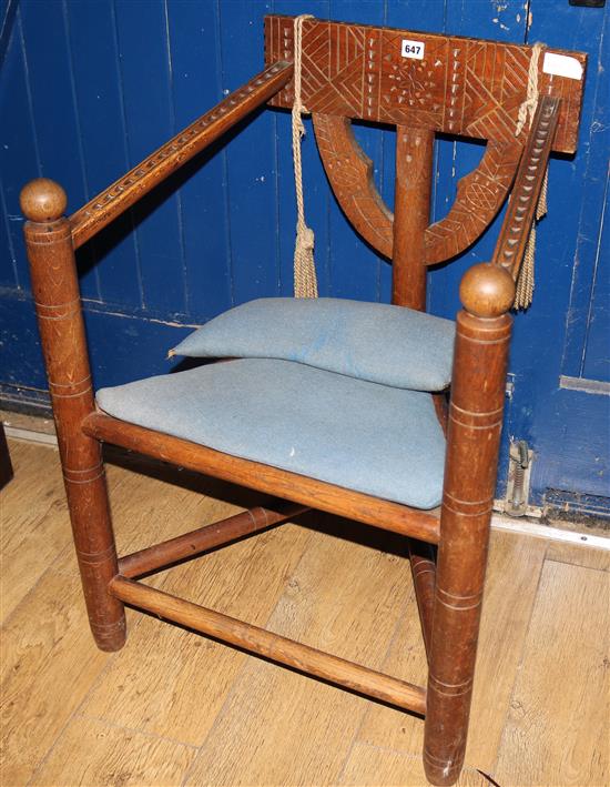 A Norwegian carved elbow chair